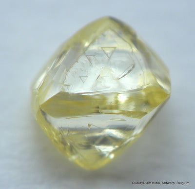 0.29 carat natural diamond out from a diamond mine. Octahedron, fancy yellow, vs2