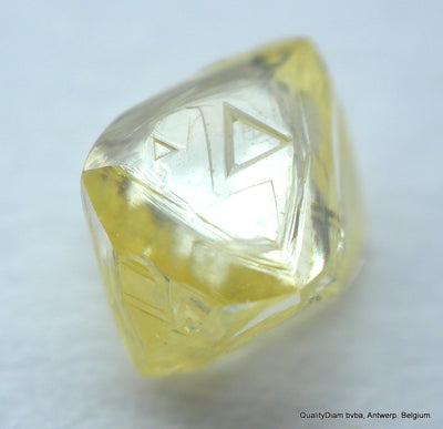 0.29 carat natural diamond out from a diamond mine. Octahedron, fancy yellow, vs2