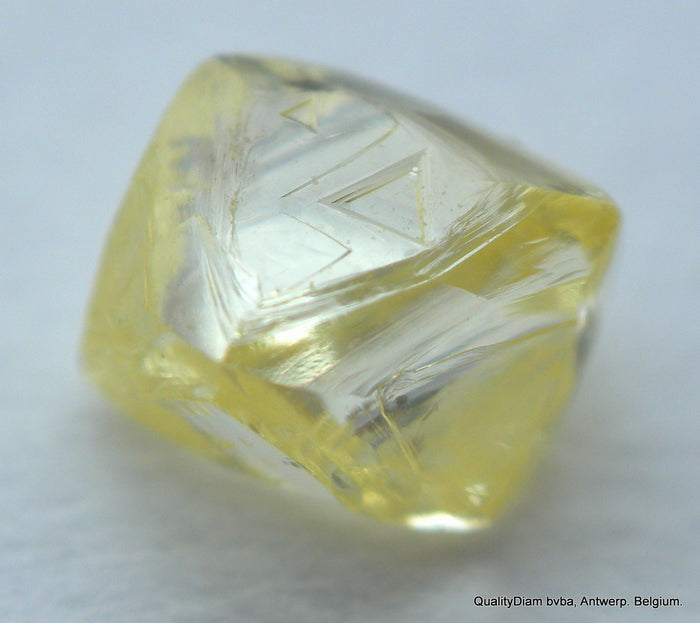 0.29 carat natural diamond out from a diamond mine. Octahedron, fancy yellow, vs2